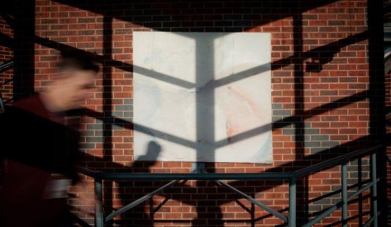 blurred man walking on a staircase